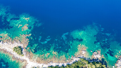 Aerial view of sea waves and fantastic Rocky coast, Greece. Top view of coastal rocks in Ionian Sea. Landscape view point of Ionian Sea  in the morning.