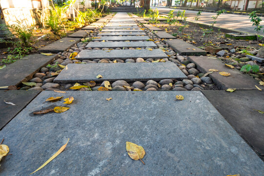 A well maintained pavement made of stone tiles and pebbles. Uttarakhand India.