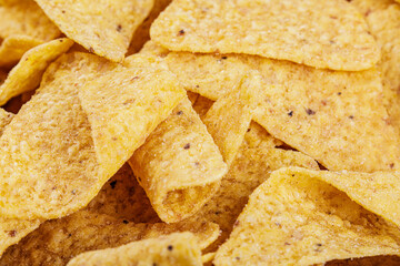 Delicious Roasted Corn Tortilla or Nacho Chips on wooden background