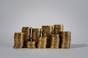 rows of coins for finance and business concept