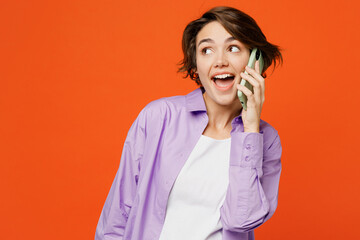 Young woman she wear purple shirt white t-shirt casual clothes talk speak on mobile cell phone...