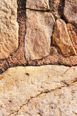 Background of stone wall texture photo. stone paving background brown surface of background texture.