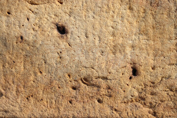 dark abstract brown stone texture of stone background Abstract relief rough gritty brown surface of background texture