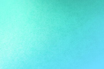 Pastel green color tone gradation with pale blue paint on environmental friendly cardboard blank box paper texture minimal background with space