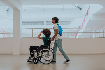Fototapeta na wymiar African American student pushing his friend's wheelchair through a modern school, demonstrating inclusion, accessibility, and the power of friendship.Assistance to people with disabilities
