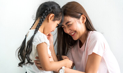 Portrait of enjoy happy love asian family mature mother and girl daughter smiling play and having fun together, mom, mother day, care, kid, child.happy family in moments good time at home