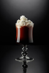 Chocolate drink with whipped cream.