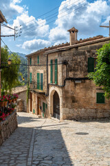 Narrow streets in historic center of town of Valldemossa, Balearic Islands Mallorca Spain.