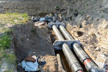 laying of new pipes in the city water supply and heating network