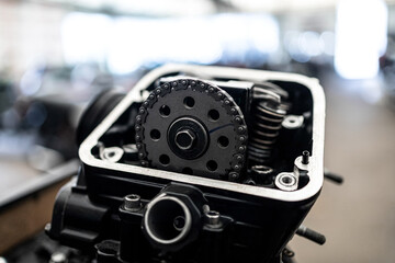 Fototapeta na wymiar Motorcycle engine in disassembled form