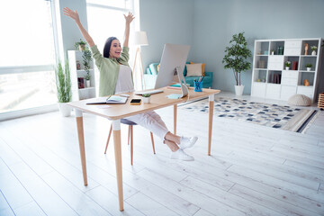 Photo of cheerful successful lady server administration software expert rejoice write new program office indoor workstation