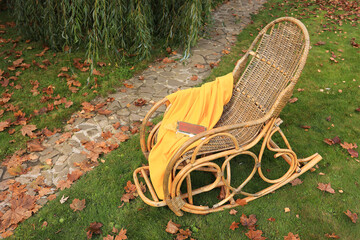 Rocking chair in the autumn garden. Soft Focus