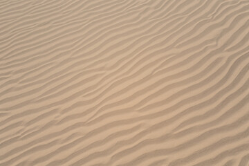 Fototapeta na wymiar Aerial Serenity: Beautiful Beach Sand from Above