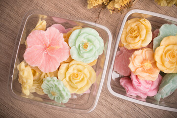 A-lua or Allure Thai handmade candy in a mini bowl on gray desktop. A-lua Thai dessert. Copy space.