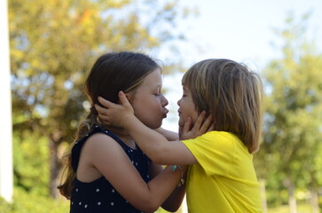 First kiss. Preschool children, first love, strong friendship