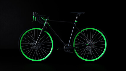 A sporty black bike with green elements on a dark background.