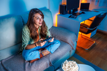 Woman having fun playing video games