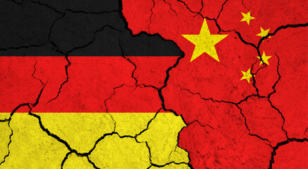 Flags of Germany and China on cracked surface - politics, relationship concept