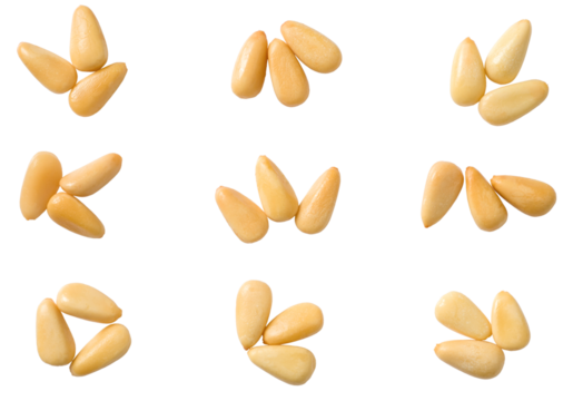 Roasted pine nuts isolated on the white background, top view.