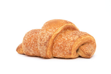 A small croissant with a shadow lying on a white background, isolated. Fresh pastries for the bakery