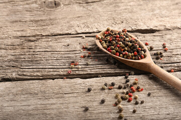 Pepper peas on wooden background