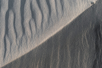 dark and light texture sand dunes in the desert