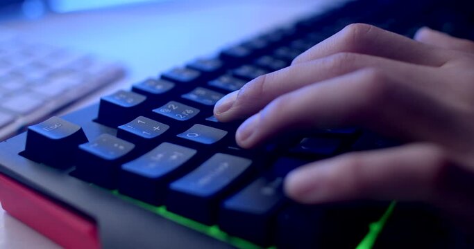 Gaming close-up hands. Using modifier keys during game. Modifier combination perform special functions gamers hand press modifier pressed carry out actions, text selection copying pasting combinations