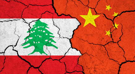 Flags of Lebanon and China on cracked surface - politics, relationship concept
