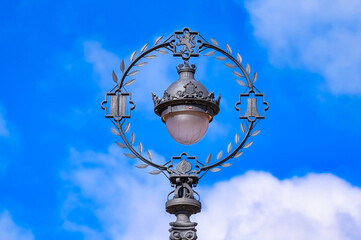 Fototapeta na wymiar Colonial style street light lamps in Plaza de Espana, Seville, Spain