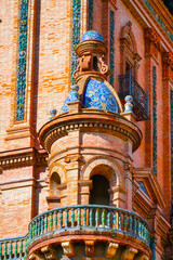 Fototapeta na wymiar Decorative balcony in small turret in Plaza de Espana, Seville, Spain