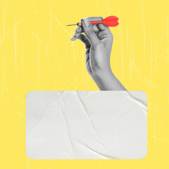 Businessman holding dart on yellow background, business targeting, aiming, focus concept.