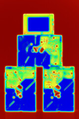 Thermal camera view over IT Pyramide with SSD Solid State Drive on top of the HDD Hard Disk drives black and white