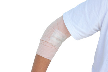 Closeup woman injured her elbow first aid is wrapped with elastic bandage to prevent...