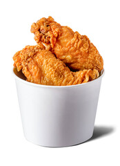 Fried chicken in paper bucket isolated
