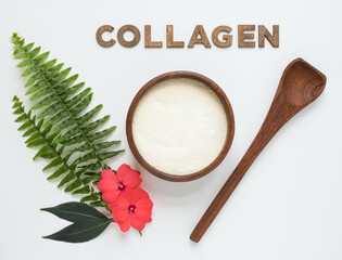 Fototapeta na wymiar Collagen Peptides in Bowl with Fern and Flowers