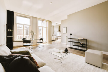 a living room with couches, coffee table and tv on the wall in it's centerpieces