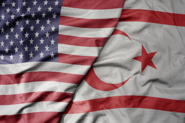 big waving colorful flag of united states of america and national flag of northern cyprus .