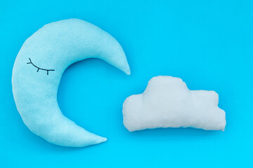Cute moon pillow with cloud. Bedding for good sleep and rest