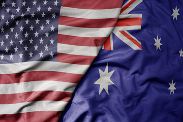 big waving colorful flag of united states of america and national flag of australia . © luzitanija