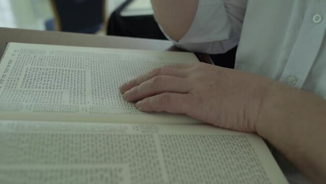 Jewish man read from the Bible torah	
