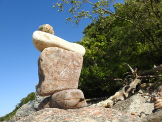 zen stones against the sky