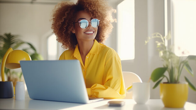 Generative AI illustration of positive black female freelancer in trendy outfit and sunglasses sitting at table with laptop while working remotely