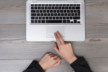 Woman's touchpad gesture, overhead view