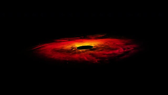 A beautiful yellow-red, fiery, bright rotating nebula with a black hole in the center, isolated on a black background. Pattern for a video on the theme of space. 4k loop video animation.