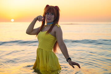 Italian girl cosplay Asuka Langley Soryu from the anime Neon Genesis Evangelion. Woman by the sea...