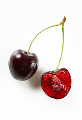 ripe and fresh cherries on a white background. harvest. fruit shop