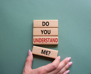 Do you understand me symbol. Concept words Do you understand me on wooden blocks. Beautiful grey...