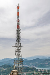 The large antenna on the summit of Mount San Salvatore overlooking Lugano, Switzerland and its lake