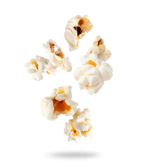 Fototapeta na wymiar Fluffy popcorn in the air closeup isolated on white background