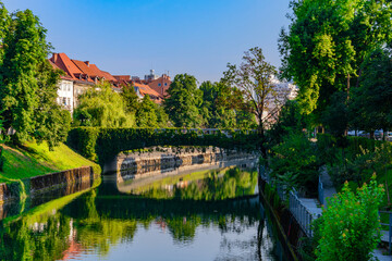 Fototapeta na wymiar Ljubljana is the green capital of Europe. Even the bridges are green. like this Sentjakobs bridge